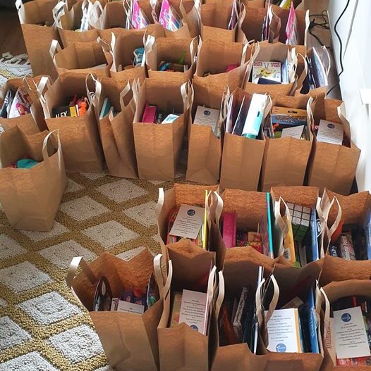 StARS activity packs lined up on floor